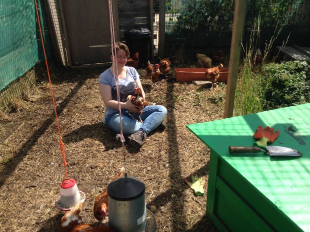 Melissa holds a friendly hen